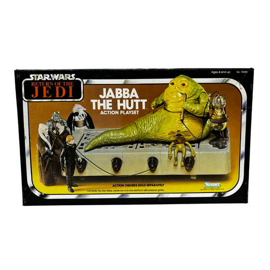 Jabba the Hutt - Action Playset

Star Wars "The Return of the Jedi"

Material: Plástico

Tamaño: 18 cm

Año: 1983

Marca: Kenner

Condición: Nuevo, Caja dañada en lateral